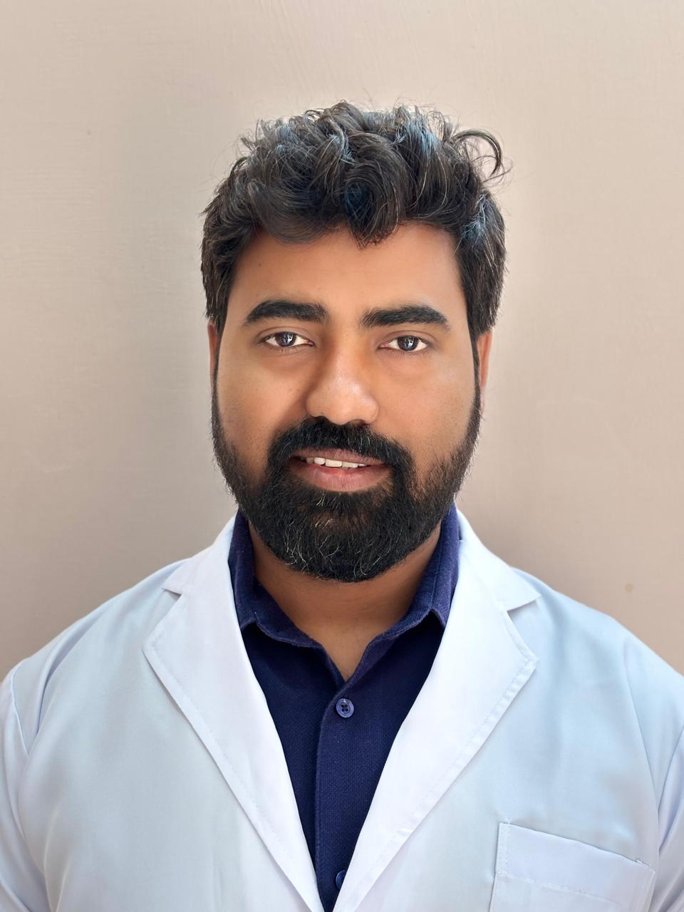 Dr. Nandesh Kumar professional portrait